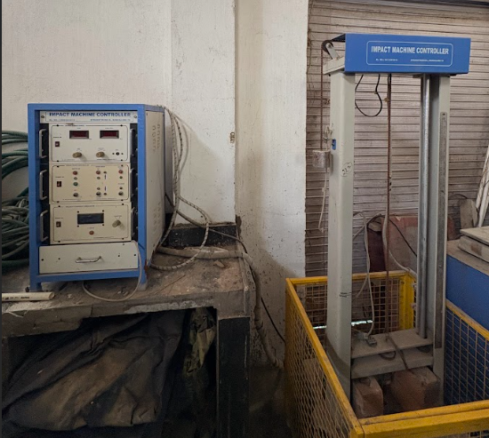 Drop impact testing apparatus